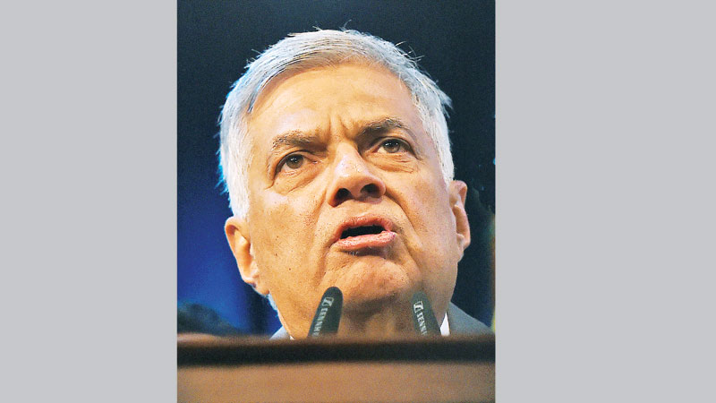 Sri Lanka reinstates ousted PM, ending power struggle